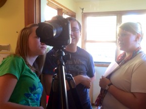 Student/director Haley Reed (right) checks the framing of a shot while working on her film, "Vigil," Thursday, July 31, 2014.
