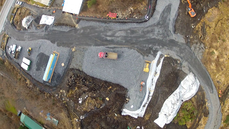 Old cars and other junk are removed from the old Byford Junkyard in this 2016 photo. Lead-contaminated soil, which was treated, will me trucked to a quarry near Pat's Creek. (Photo courtesy Department of Environmental Conservation.)
